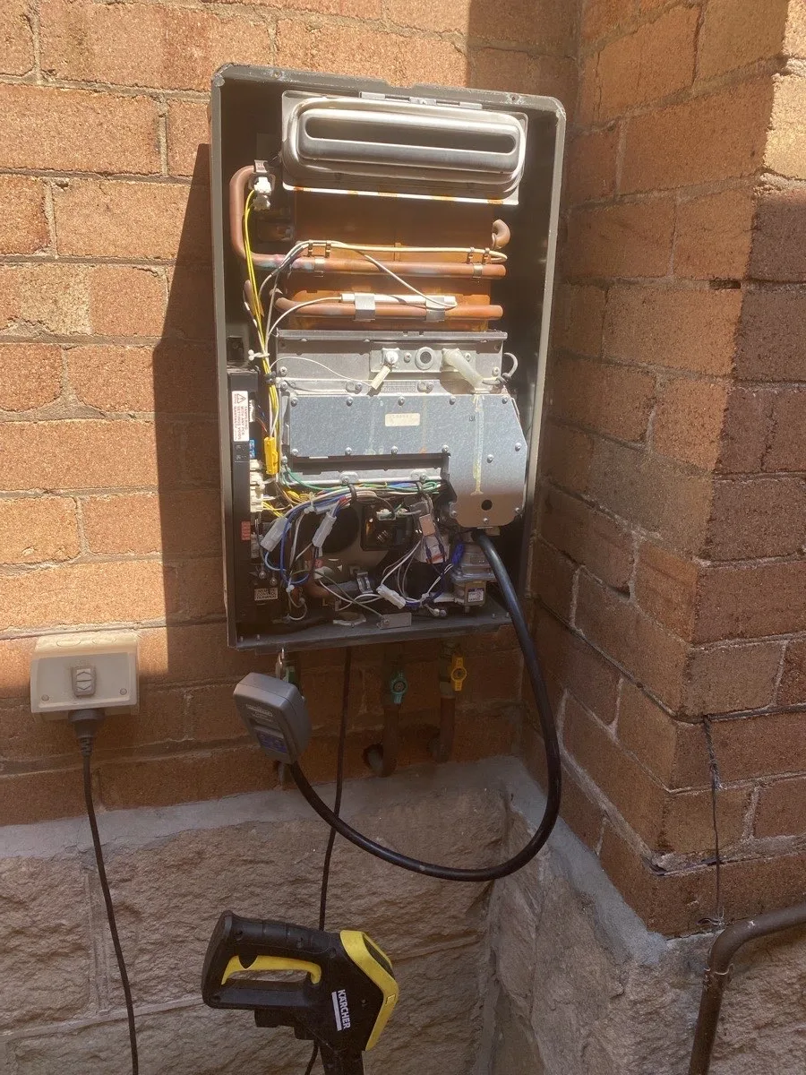 Rinnai gas hot water heater being serviced in Collaroy