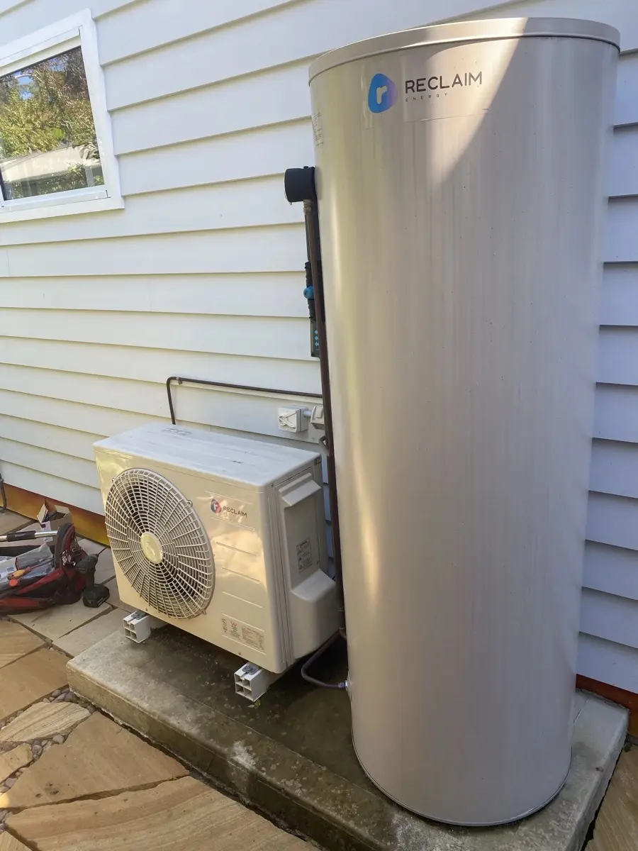 Reclaim Energy CO2 heat pump — compressor and stainless steel tank with Reclaim branding installed by Northern Beaches Hot Water