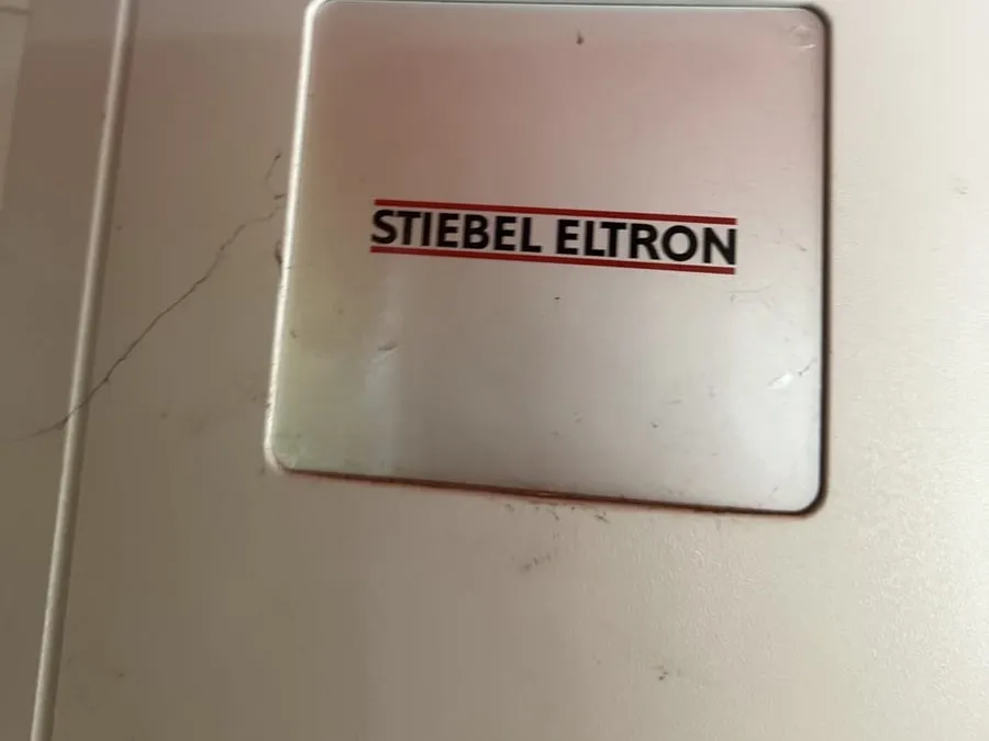 Stiebel Eltron brand badge on heat pump unit in Allambie